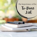 up close shot of pens sitting on tops of notebooks