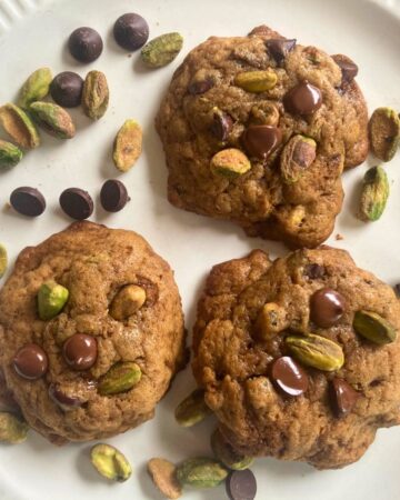 close up shot of sourdough chocolate chip pistachio cookies